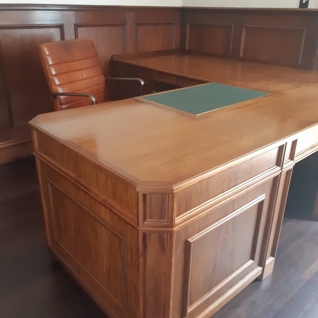 Large luxurious timber desk with chair