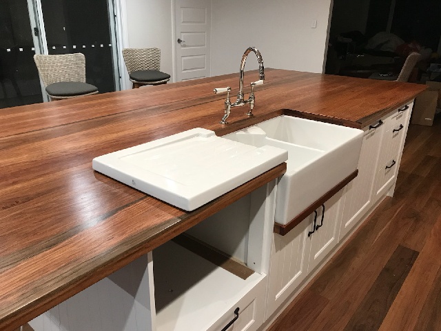 Kitchen timber bench-top with white sink